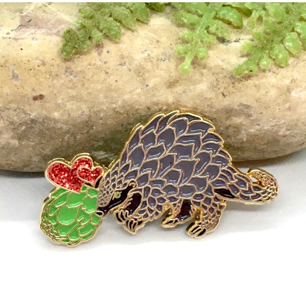 A set of two Pangolin Enamel Pins